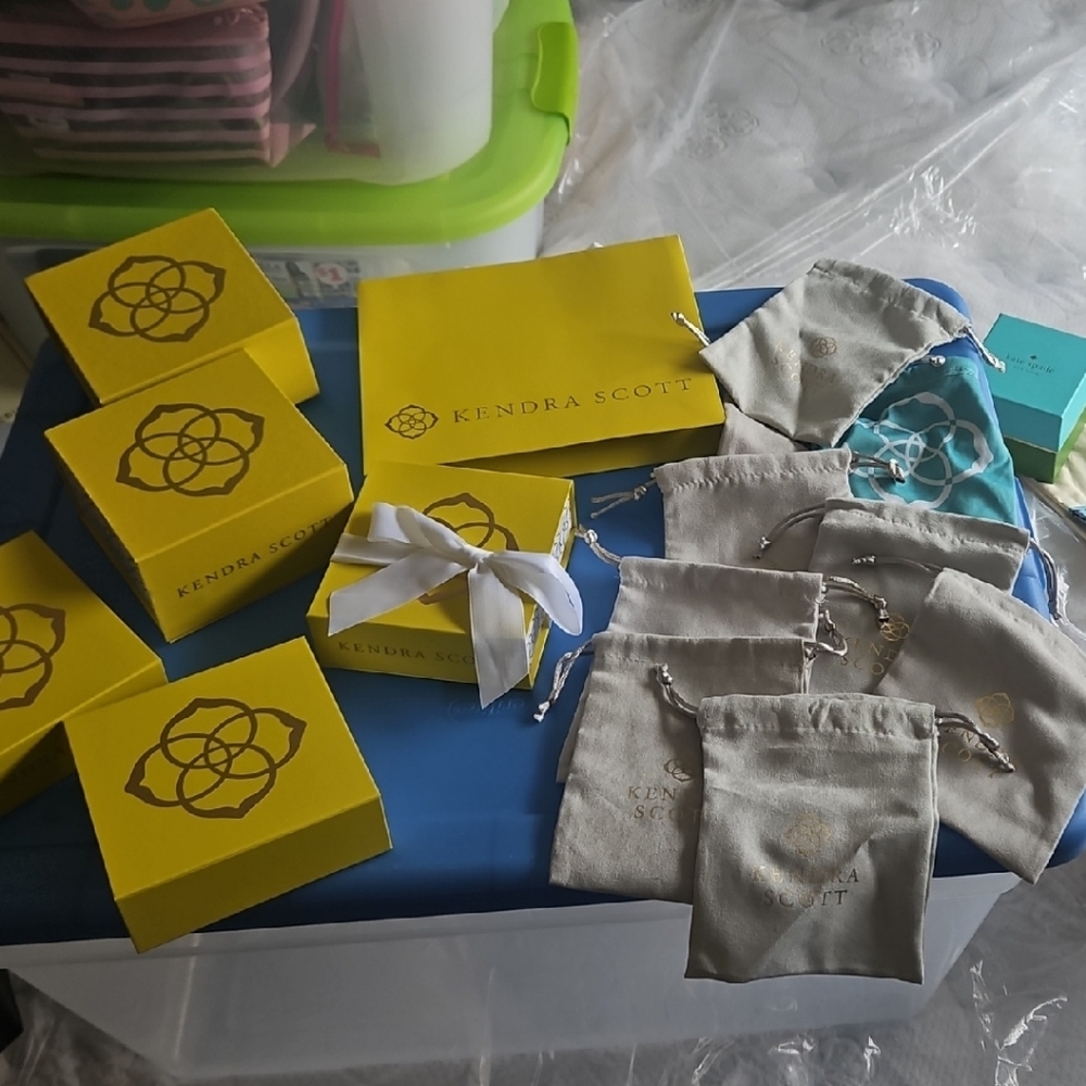 Kendra Scott Yellow Boxes, Yellow Bag, And Pouches.